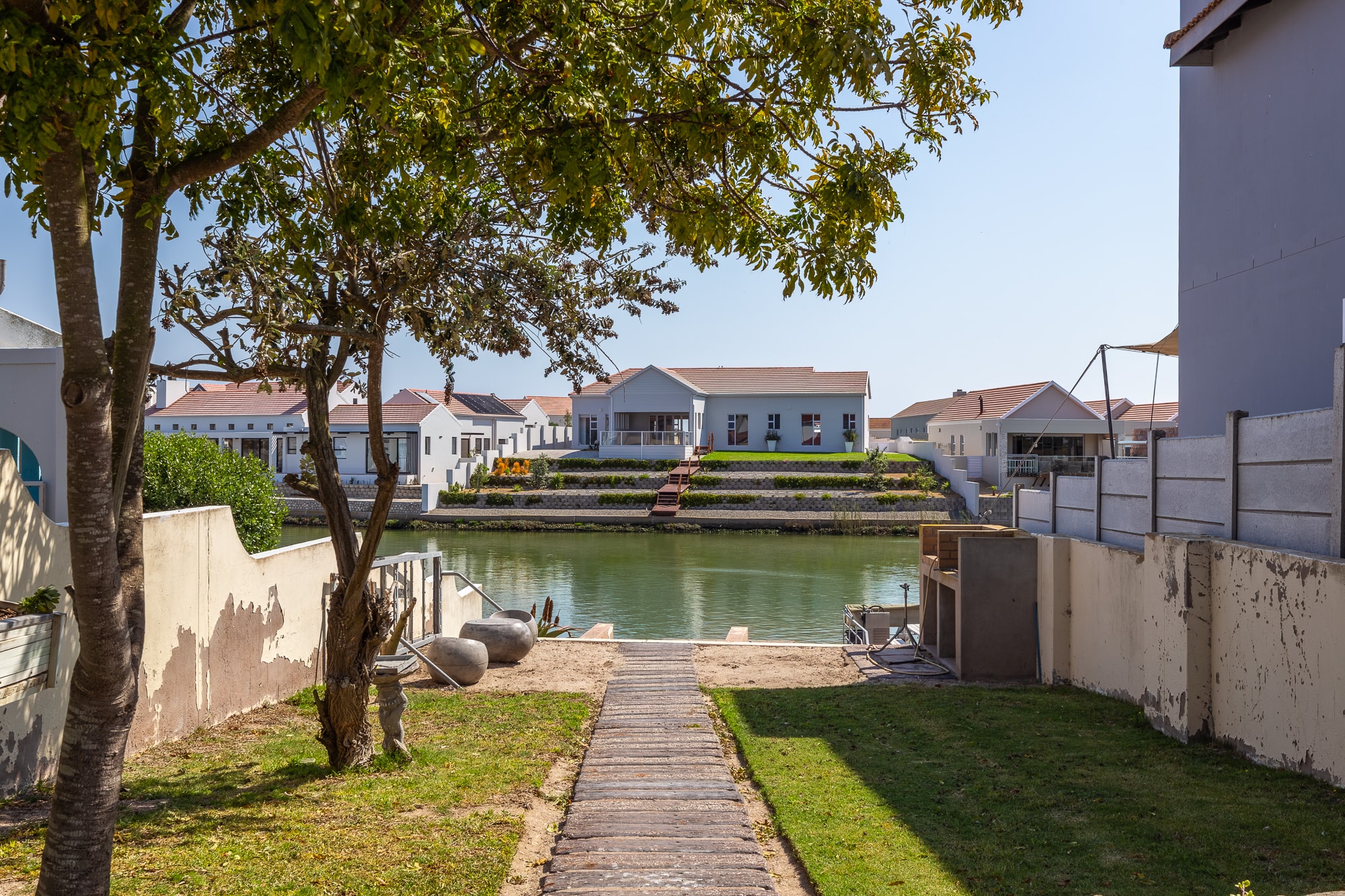 Waterfront village with canal and houses